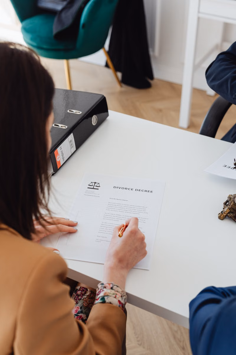 Couple reviewing a family transition plan with a mediator