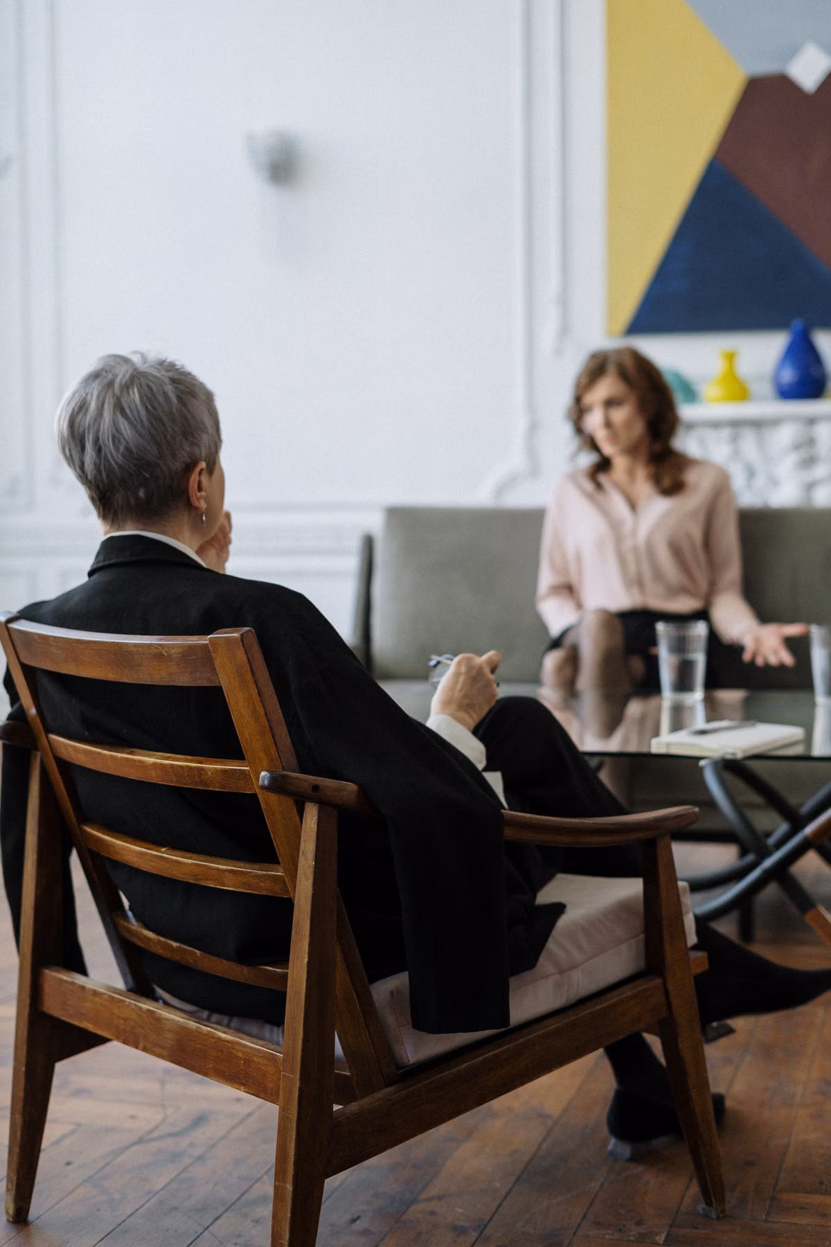 Separating couple speaking calmly with a divorce mediator