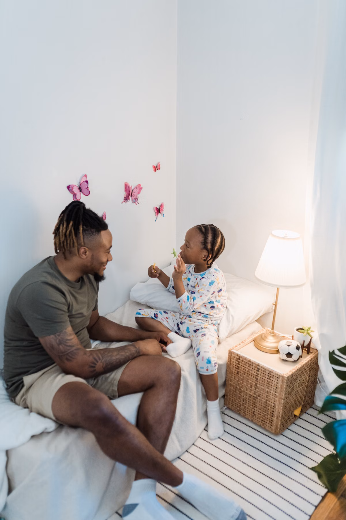 Separated parents working through a co-parenting plan with a professional
